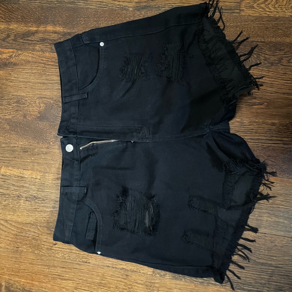 Black distressed shorts